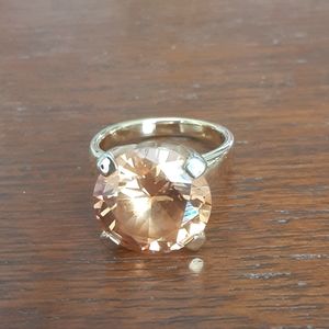 Large Amber rhinestone in a goldtone ring setting